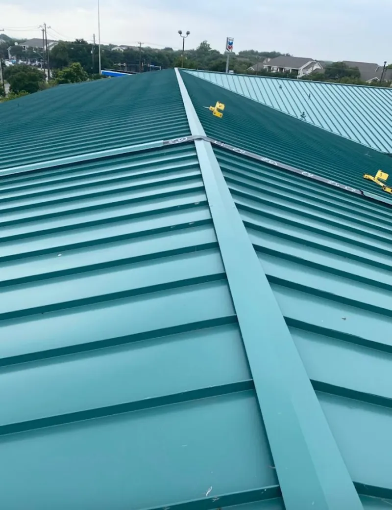 Green commercial metal roof ridge and valley for Metal Roof Repair in Kayenta